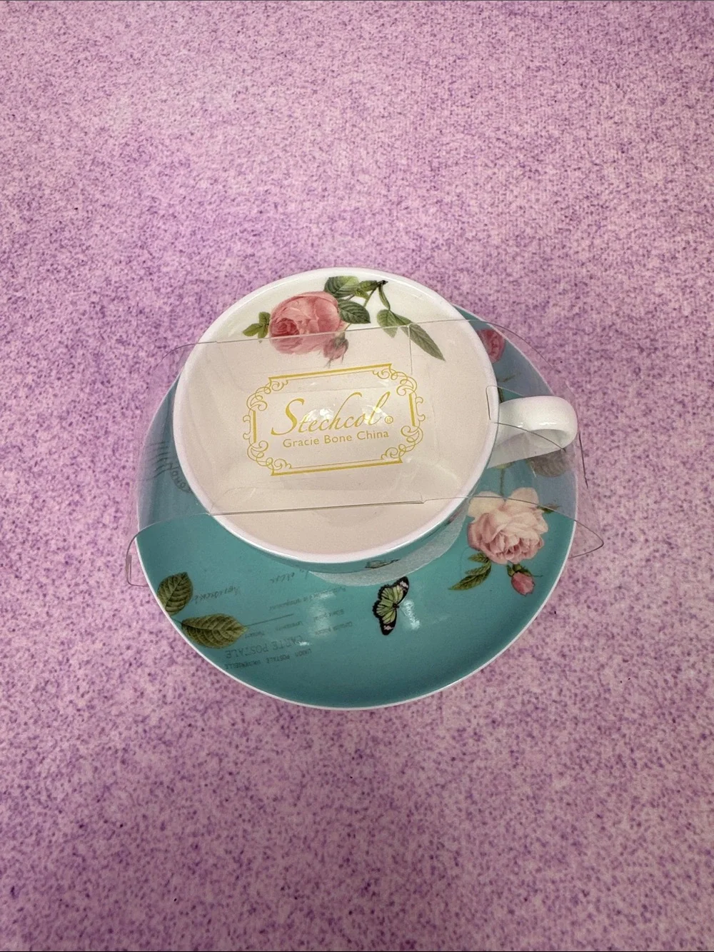 Blue Floral Porcelain Teacup and Saucer - Rose Motif